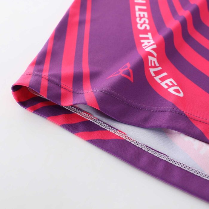 Close up of the hem of a cycling top showing stitching