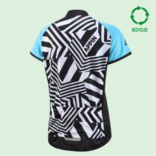 Back view of a women's short sleeve cycle top with black and white pattern, bright blue sleeves and a circular "recycled" logo in the top right hand corner