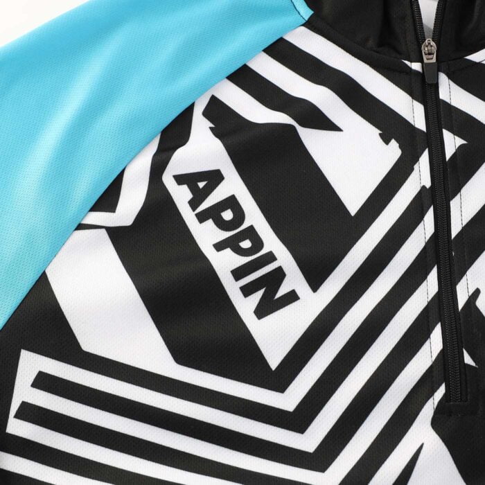 Close up shot of the neck, top of the zip and fabric detail of a cycling jersey