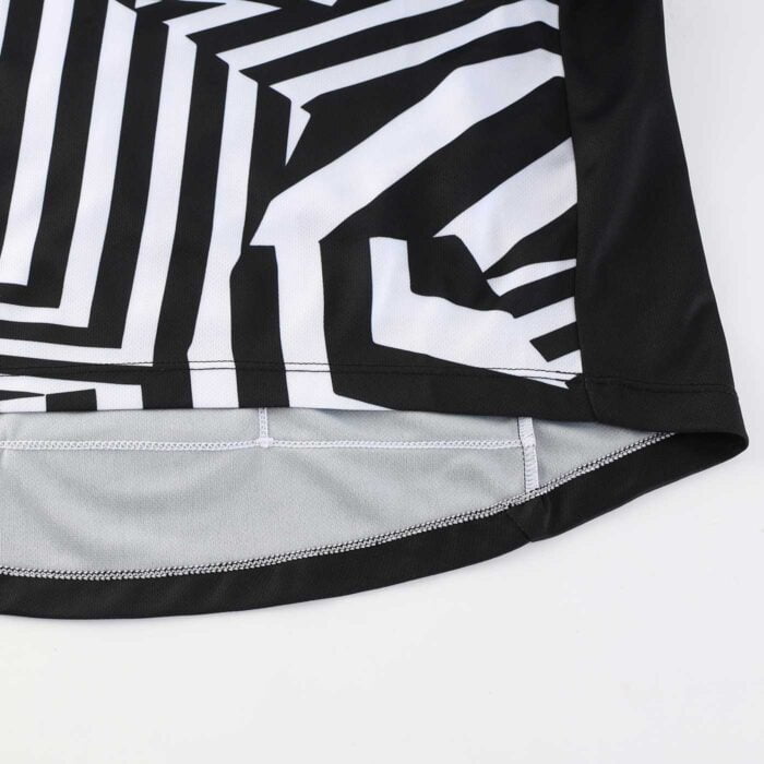 Close uof showing the curved lower hem shaping of a cycle jersey