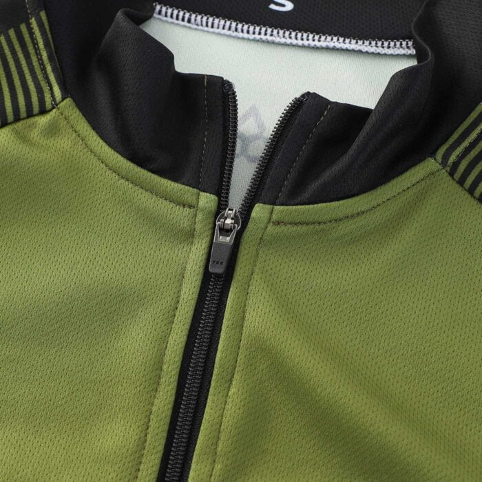 Close up of the top of the zipper of a cycling jersey showing the quality of stitching