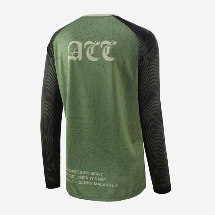 Reverse view of long sleeved top with olve green and black pattern